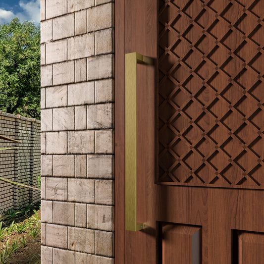 Close-up of a wooden door with decorative lattice design and stone wall.